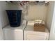 Small laundry room with washing machine and dryer at 2000 University Woods Rd # 203, Raleigh, NC 27603