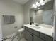 Bathroom features a well-lit vanity with neutral colors and a modern design at 202 S Pearl St, Princeton, NC 27569