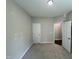 Bedroom featuring carpet, off-white walls, and a closet at 202 S Pearl St, Princeton, NC 27569