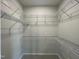 Walk-in closet featuring shelving for organization and storage at 202 S Pearl St, Princeton, NC 27569