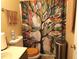 Bathroom featuring a toilet and shower with a colorful artistic shower curtain at 220 Howard St, Burlington, NC 27217
