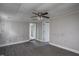 Spacious living room features wood-look flooring with multiple entry points at 306 W Main St, Pine Level, NC 27568