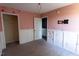 Cozy bedroom with a closet, door to another room, and pink walls at 328 Mccarthy Dr, Clayton, NC 27527