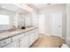 Elegant bathroom with double vanity, granite countertop, tile flooring, and walk-in shower at 3661 Manifest Pl, Cary, NC 27519