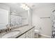 Bathroom features vanity with granite countertop and shower-tub combo at 3661 Manifest Pl, Cary, NC 27519