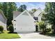Charming two-story home with white siding, black shutters, and a well-manicured lawn at 3661 Manifest Pl, Cary, NC 27519