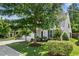 Lovely two-story home exterior with black shutters, and manicured landscaping at 3661 Manifest Pl, Cary, NC 27519