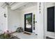 Warm welcome with a glass front door, and decorative flower arrangement at 3661 Manifest Pl, Cary, NC 27519