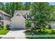 Charming two-story home with a well-maintained lawn and a two car garage at 3661 Manifest Pl, Cary, NC 27519