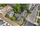 Aerial view of residential neighborhood near a modern apartment building, and lush trees at 407 N Boylan Ave, Raleigh, NC 27603