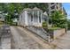 Classic home with an inviting porch, set on a hillside and featuring a quaint design that blends charm and character at 407 N Boylan Ave, Raleigh, NC 27603