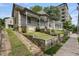 Charming home with inviting front porch, situated on a lush, landscaped lot with classic architectural design and great curb appeal at 407 N Boylan Ave, Raleigh, NC 27603