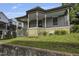 Charming home with inviting front porch, situated on a lush, landscaped lot with classic architectural design and great curb appeal at 407 N Boylan Ave, Raleigh, NC 27603