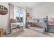 Light-filled bedroom with bunk beds, neutral carpet, window and ample natural light at 41 Liam Dr, Broadway, NC 27505