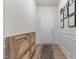 Stylish entryway with wood-look floors, paneling, decorative accents, and a welcoming atmosphere at 41 Liam Dr, Broadway, NC 27505
