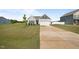 Charming single-Gathering home with a well-manicured lawn, a two-car garage, and lovely curb appeal at 41 Liam Dr, Broadway, NC 27505