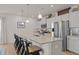 Bright kitchen featuring granite countertops, stainless steel appliances, and ample cabinet space at 41 Liam Dr, Broadway, NC 27505