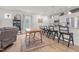 Open-concept living room with a view of the kitchen featuring an island with barstool seating at 41 Liam Dr, Broadway, NC 27505