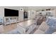 Open concept living room, featuring stylish decor, a ceiling fan, and comfortable seating at 41 Liam Dr, Broadway, NC 27505