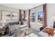 Inviting bedroom provides a comfortable daybed, decorative wallpaper, and abundant natural light from multiple windows at 430 Rowe Way, Knightdale, NC 27545