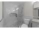 Modern bathroom features a glass shower door, sleek fixtures, and mosaic tile accents at 6008 Chittim Ct, Raleigh, NC 27616