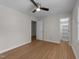 Bedroom with wood floors, neutral walls, and a ceiling fan at 6008 Chittim Ct, Raleigh, NC 27616