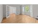Bright bedroom with hardwood floors and natural light, perfect for a relaxing and comfortable living space at 6008 Chittim Ct, Raleigh, NC 27616