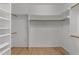 Walk-in closet with shelving and wood flooring at 6008 Chittim Ct, Raleigh, NC 27616