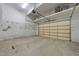 Spacious garage with ample storage space, including overhead shelving and wall-mounted organizers at 6008 Chittim Ct, Raleigh, NC 27616