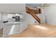 Open-concept kitchen featuring modern appliances, lots of counter space, and access to the living areas at 6008 Chittim Ct, Raleigh, NC 27616