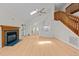 Inviting living room with fireplace, hardwood floors, and skylights, perfect for relaxing and entertaining guests at 6008 Chittim Ct, Raleigh, NC 27616
