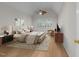 Serene primary bedroom featuring vaulted ceilings, a ceiling fan, and soft, neutral tones at 6008 Chittim Ct, Raleigh, NC 27616