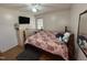 Comfortable bedroom featuring hardwood floors and natural lighting at 6908 Park Pl, Raleigh, NC 27616