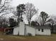 Exterior view of home with siding, with ladder and bicycle visible at 6908 Park Pl, Raleigh, NC 27616