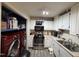 Efficient kitchen with appliances and ample storage space at 6908 Park Pl, Raleigh, NC 27616