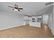 Open-concept living space with kitchen featuring island, living room, and dining area at 701 Jamescroft Way, Rolesville, NC 27571