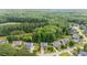 Beautiful homes in a lush neighborhood surrounded by a dense forest, providing a private and serene setting at 7336 Capulin Crest Dr, Apex, NC 27539