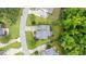 Aerial view showcasing the property's layout, landscaping, and neighborhood surroundings at 7336 Capulin Crest Dr, Apex, NC 27539
