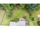 This aerial shows the layout of the backyard with a playground and grill station at 7336 Capulin Crest Dr, Apex, NC 27539