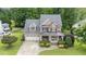 Beautiful brick home with mature trees, a two-car garage, and well-maintained landscaping at 7336 Capulin Crest Dr, Apex, NC 27539
