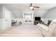 Large bonus room offering ample space and featuring a window bench with a view to the backyard at 7336 Capulin Crest Dr, Apex, NC 27539