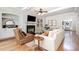 Inviting living room with fireplace, built-in shelving, and comfortable seating at 7336 Capulin Crest Dr, Apex, NC 27539