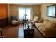 Inviting living room features hardwood floors, neutral tones, and comfortable seating arrangement at 10 Winchester Ct, Durham, NC 27707