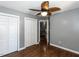Bedroom featuring hardwood floors, closet, and access to the hall at 102 Sanair Ct, Apex, NC 27502