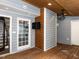 Inviting sun room featuring wood floors and a ceiling fan at 102 Sanair Ct, Apex, NC 27502