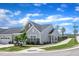 Charming single-Gathering home with well-manicured lawn, stone accents, and inviting curb appeal on a corner lot at 1021 Shellbank Dr, Durham, NC 27703