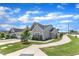 Inviting street view showcasing the home's well-maintained lawn, sidewalk access, and community charm at 1021 Shellbank Dr, Durham, NC 27703