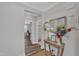 Neutral foyer with hardwood flooring and decor and view to an office, bath and bedroom at 1021 Shellbank Dr, Durham, NC 27703