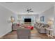 Cozy living room with hardwood floors, two sofas, chairs, tv, and neutral tones, perfect for relaxation at 1021 Shellbank Dr, Durham, NC 27703