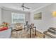 Neutral-toned office with natural light features a desk and seating area for relaxing at 1021 Shellbank Dr, Durham, NC 27703